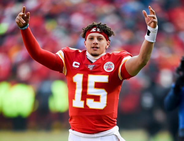 Mahomes runs onto the field during pregame introductions before the AFC Championship Game against the Titans on Jan. 19, 2020, at Arrowhead Stadium.  Kansas City Star / Tammy Ljungblad