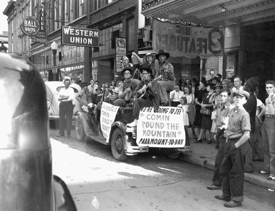 Residents dressed up to see "Comin' Round The Mountain," a Western film starring Gene Autry, Ann Rutherford, and Smiley Burnette, at the Paramount Theater on State Street, Bristol, TN, 1936. Courtesy Bristol Historical Association