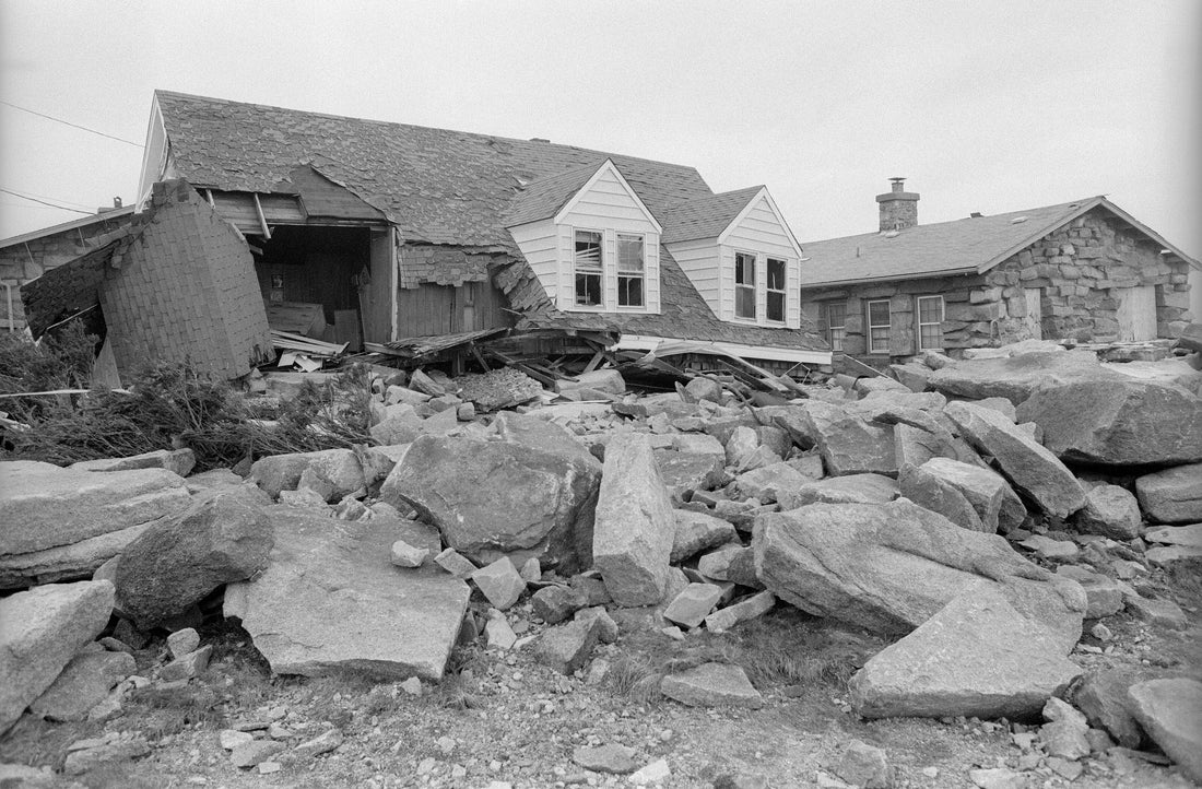 Only the roof and dormers remain of this house at Andrews Point, Rockport. The house in the background was one of the homes badly damaged in the Blizzard of ’78. Gail McCarthy/Gloucester Daily Times
