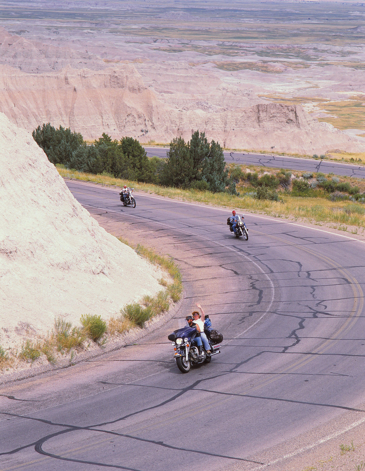 Riders twist and turn through Badlands National Park on their way to the Sturgis motorcycle rally in 1990.