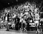 The Duke bench erupts in celebration as Duke clinches a victory over UNC in Cameron Indoor Stadium, March 3, 1986. Jonathan Wiggs