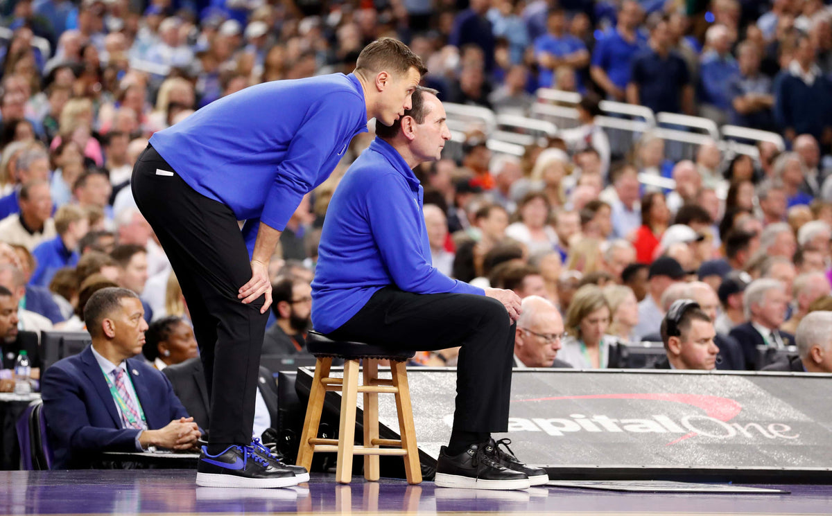 Duke associate head coach Jon Scheyer talks with head coach Mike Krzyzewski during the second half of UNC’s 81-77 victory over Duke in the Final Four at Caesars Superdome in New Orleans, La., April 2, 2022. Ethan Hyman/The News & Observer