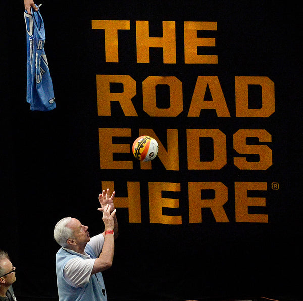 UNC head coach Roy Williams tosses a ball back to a fan after the Tar Heels hold their open practice, March 31, 2017, at the NCAA Final Four in Glendale, Ariz., in the University of Phoenix Stadium. The Heels will play Oregon in the semi-final game. Courtesy Chuck Liddy / The News & Observer