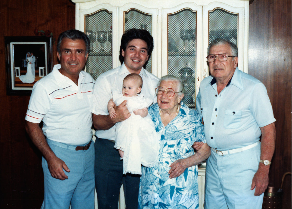 Bernie, Tony, Jenna and Anthony Cornelius and Anglena Coniglio after the baptism of Jenna Cornelius in 1988. Photo shows five generations of Cornelius family members.