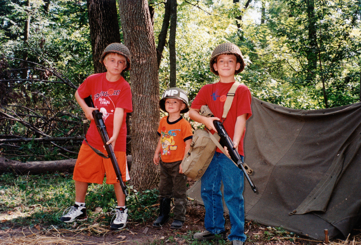 From left are Mark, Henry and Adam Campbell, dressed for the World War II Days in 2004.