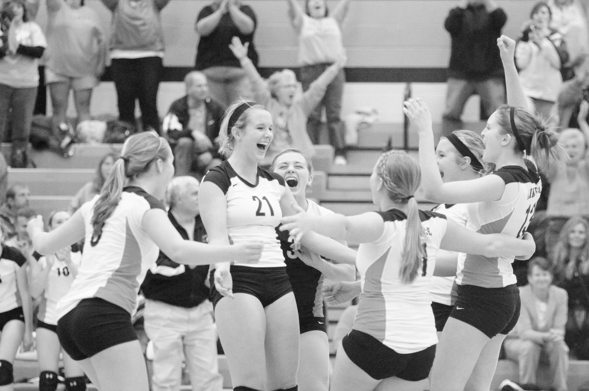 Linesville High girls volleyball celebrating a victory during their 2011 season. They went on to win the school's first state title since 1986 with a 25-20, 25-16, 25-22 win over Clarion Area at Central York High School in November 2011. The win capped a perfect 25-0 season for the Lady Lions. Courtesy Meadville Tribune