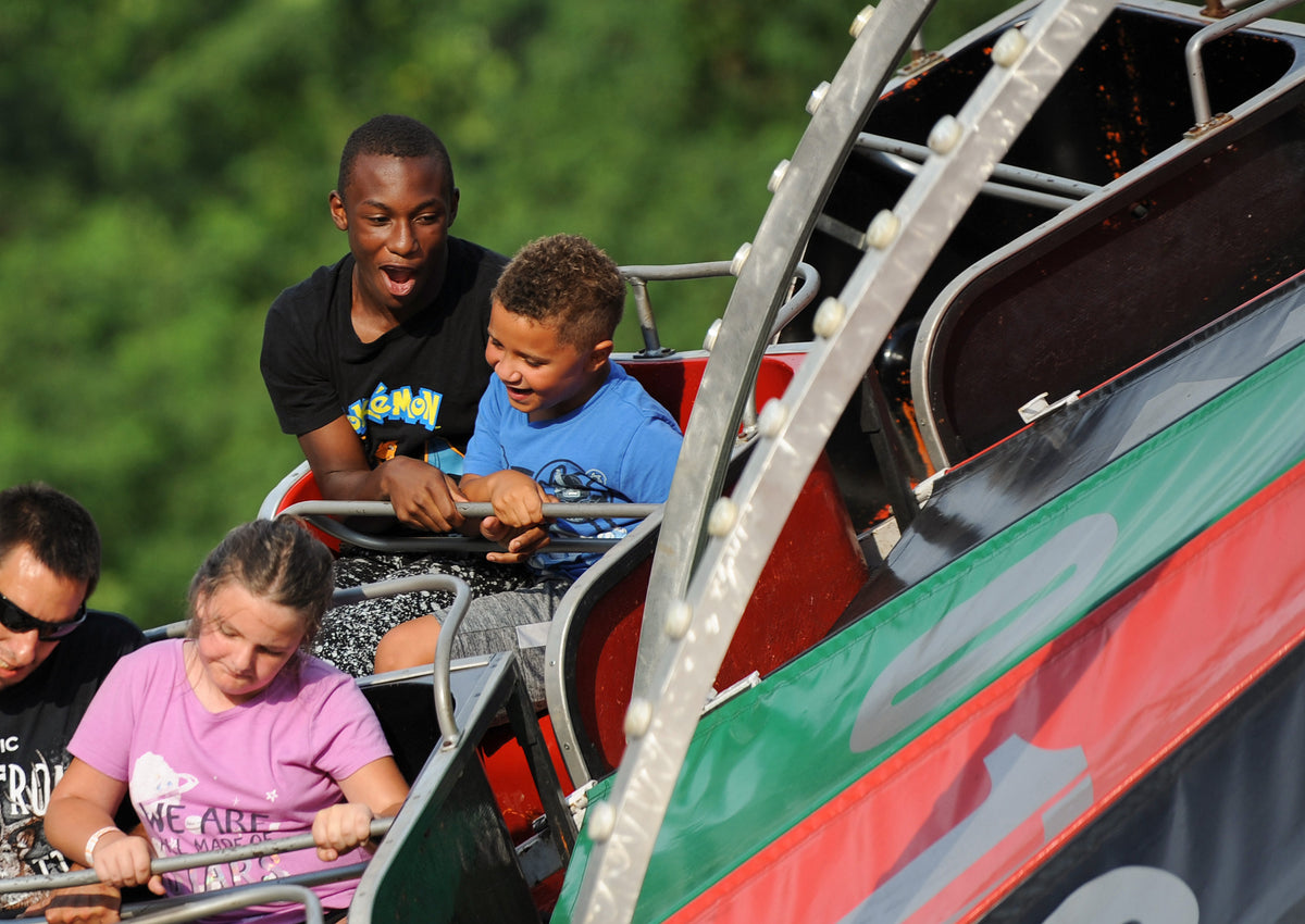 From left are friends Nigel Jules (13) and Isaiah Stotler (7) riding “Casino” at the Ferndale Volunteer Fire Association’s 88th Annual Jubilee in Johnstown, July 16, 2018. Courtesy The Tribune-Democrat