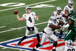 Las Vegas Raiders quarterback Derek Carr (4) in action during an NFL football game against the New York Jets, Dec. 6, 2020, in East Rutherford, N.J. AP Photo/Adam Hunger