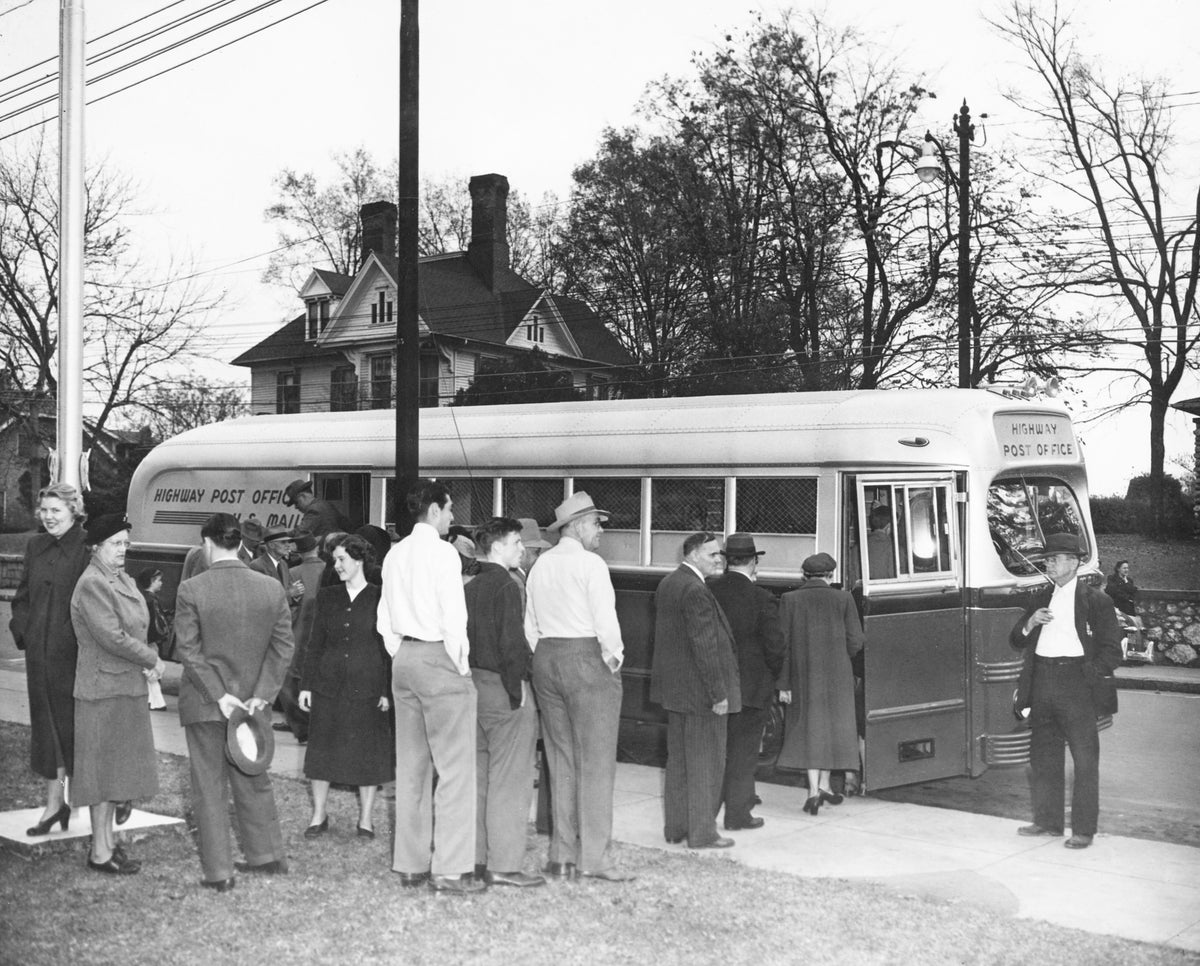 Asheboro Chamber of Commerce inspecting the “Highway Post Office” bus, November 28, 1949. Courtesy Randolph County Public Library