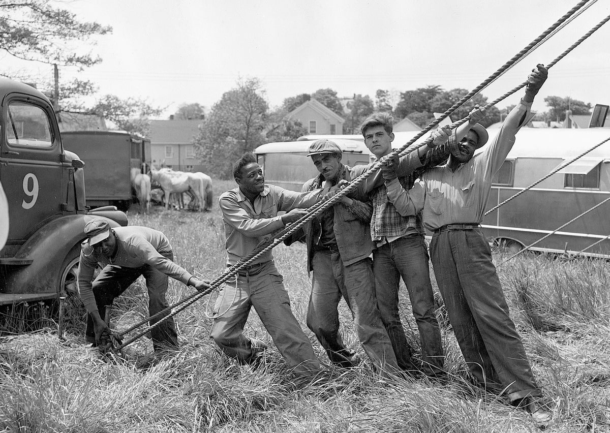 Group tightening outside ropes for a circus tent, July 9, 1950. Courtesy The Providence Journal