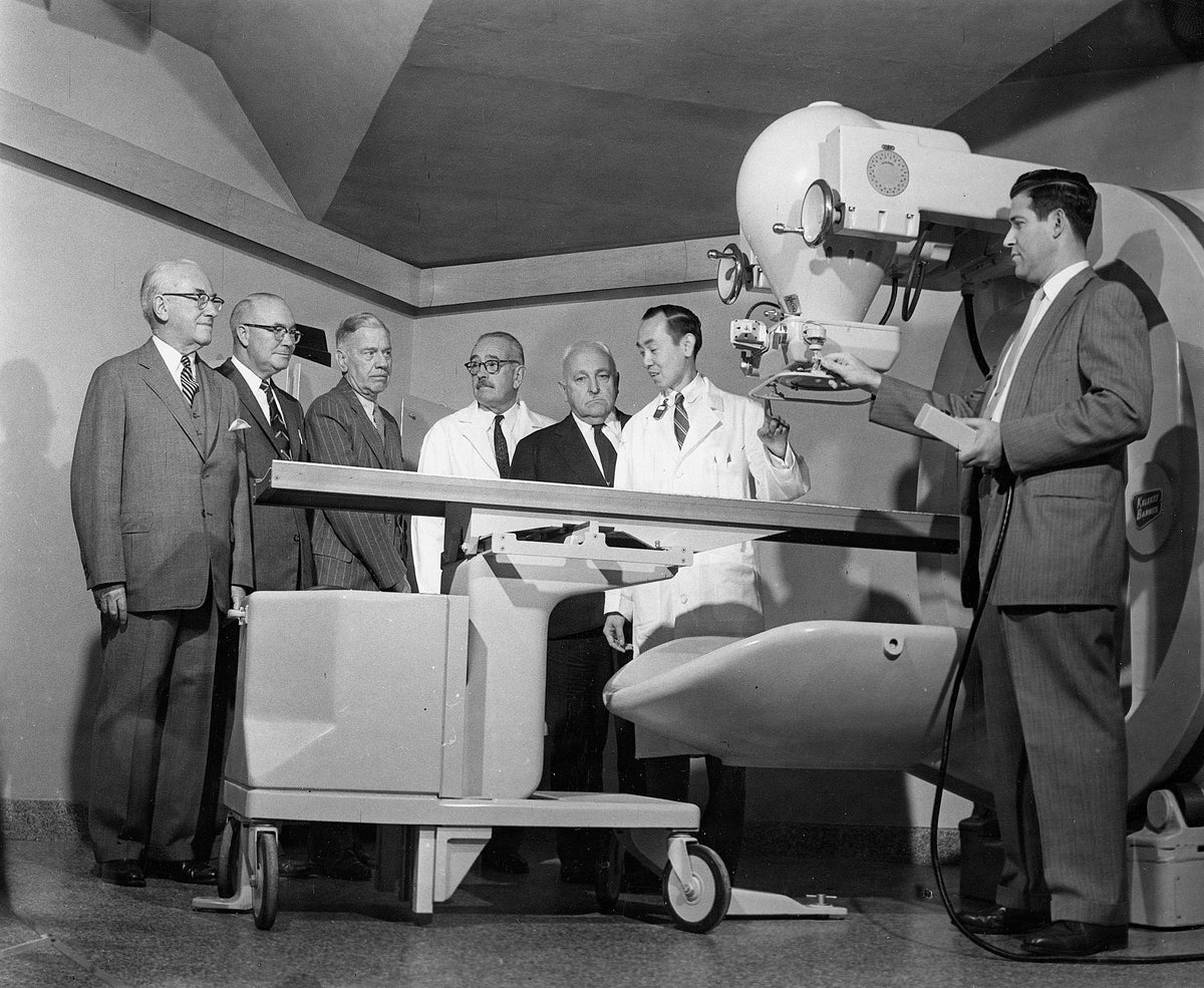 Cobalt machine at Roger Williams Hospital, November 1958. From left: Webster Knight II, Vice President and Director; Hovey T. Freeman, Trustee and Chairman of the Building Committee; Dr. Russell Hunt, Chief of the Radiological Department; Dr. Richard Wang; Mr. Norman Torman, X-Ray Engineer for the Keleket Corporation. Courtesy The Providence Journal