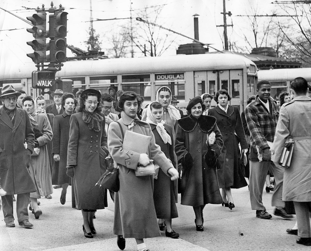 People disembarking from public transit, December 1949. Courtesy The Providence Journal