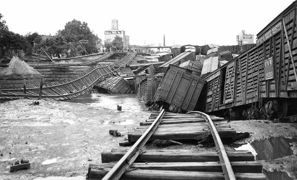 Mangled railroad cars in the Sioux City stockyards after the Floyd River flood, June 8, 1953. Sioux City Museum