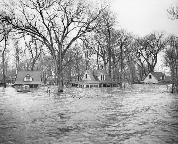 Missouri river floodwaters nearly reaching the roofs of homes in Sioux City in 1952. Sioux City Museum