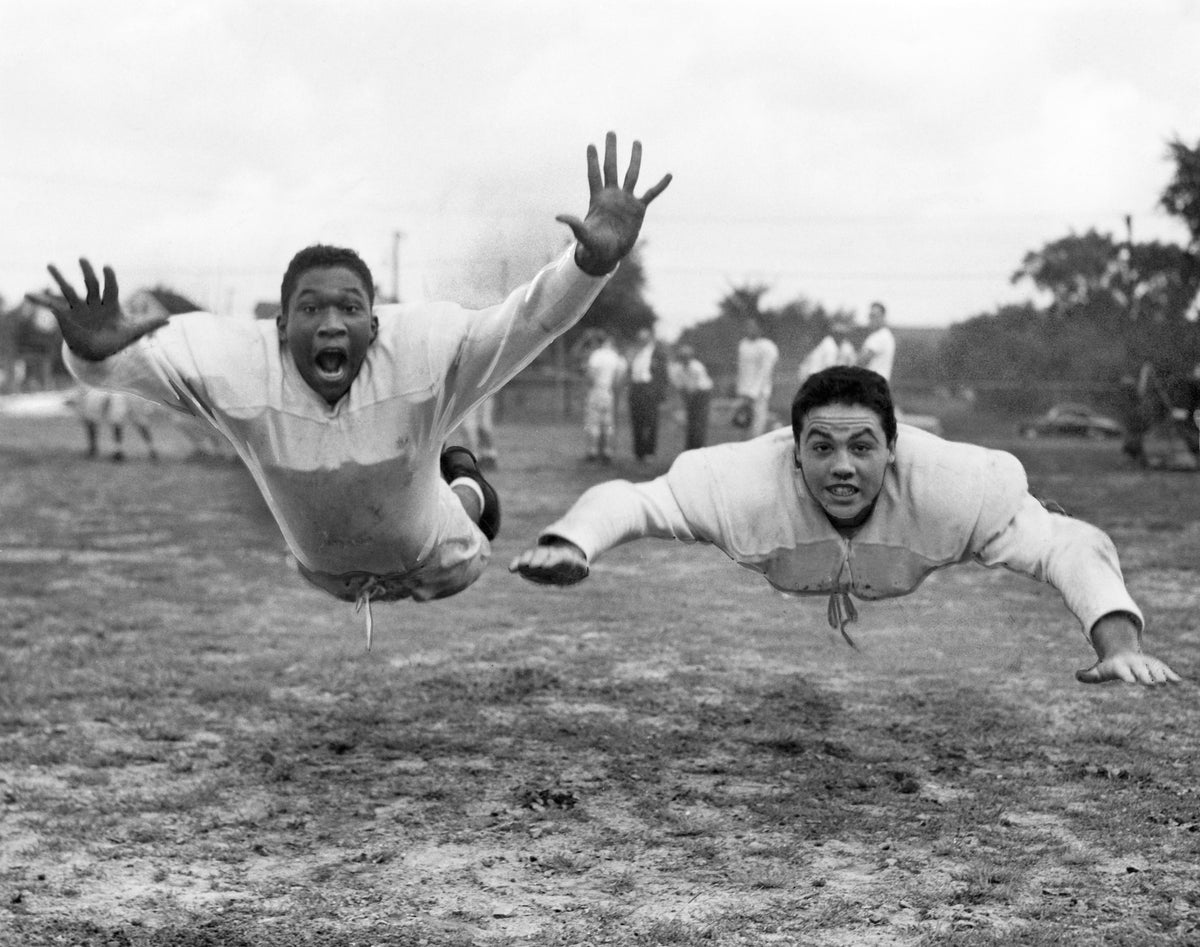 Milt Morgan (left) and Dave Hull, football players at John Adams High School in 1955. Courtesy Cleveland Public Library Photograph Collection/#SCL015313_21