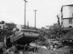 This is the car that Thomas Moody Sr., his wife, Margaret, their three children and neighbor Tony Orsini were in when it was overturned by the floodwaters. Mrs. Moody was killed. Anthony P. Orsini