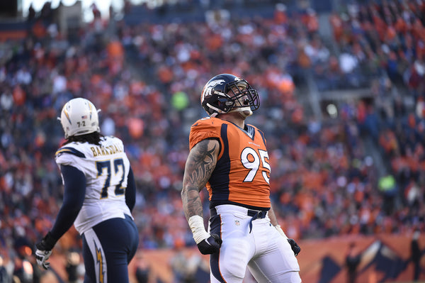 DENVER, CO - JANUARY 03: Derek Wolfe (95) of the Denver Broncos celebrates a sack in the second quarter. The Denver Broncos played the San Diego Chargers at Sports Authority Field at Mile High in Denver, CO on January 3, 2016. (Photo by Joe Amon/The Denver Post)