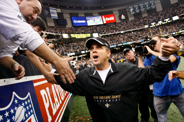 Saint's coach Sean Payton high fives the fans after beating the Eagles, January 13, 2007. Matt Rose