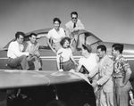 Aviation Committee members gather at the second annual San Diego Air Games in October 1951 at Montgomery Field. From left: Jim Snapp Jr., Norma Levi, Lowanda Gabriel, Patricia Allison, James Hansen, George May Jr., Joseph Pisciotta, Jess Busco. Courtesy Union-Tribune
