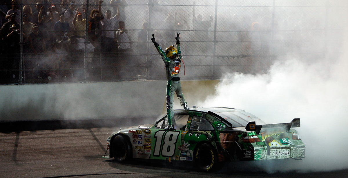 Kyle Busch, driver of the No. 18 M&M’s Indiana Jones Toyota, celebrates after winning the 2008 Dodge Challenger 500 at Darlington Raceway. Chris Graythen / Getty Images  ^^ left light rgba(0,0,0,0.2)