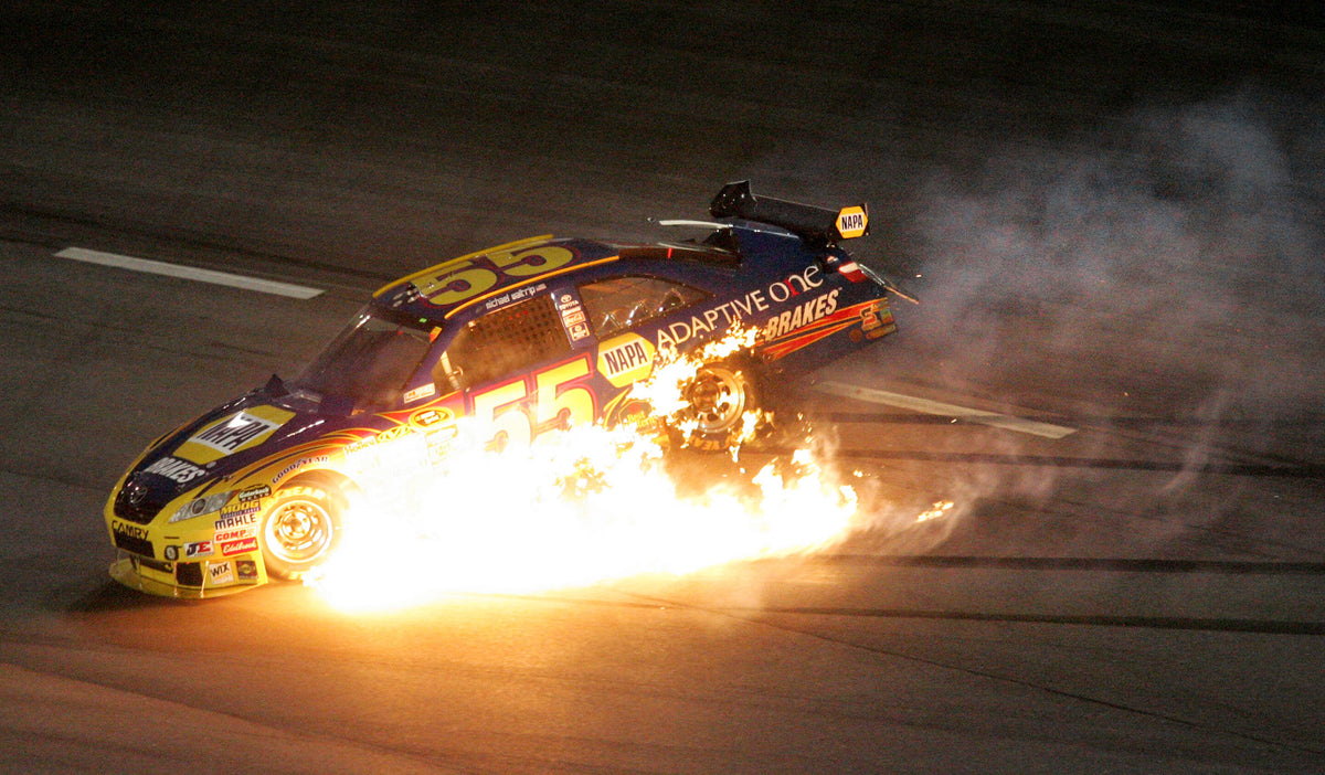 Michael Waltrip’s car catches on fire on Lap 74 during the 2009 Southern 500 at Darlington Raceway.Courtesy Gerry Melendez / The State via Getty Images