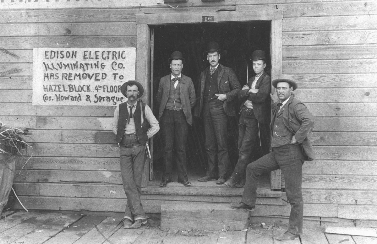 Edison Electric Illuminating Company with a sign indicating the company's move to new offices on the fourth floor of the newly constructed Hazel block at the corner of Howard and Sprague in Spokane, circa 1988. Courtesy Spokane Public Library/Northwest Room