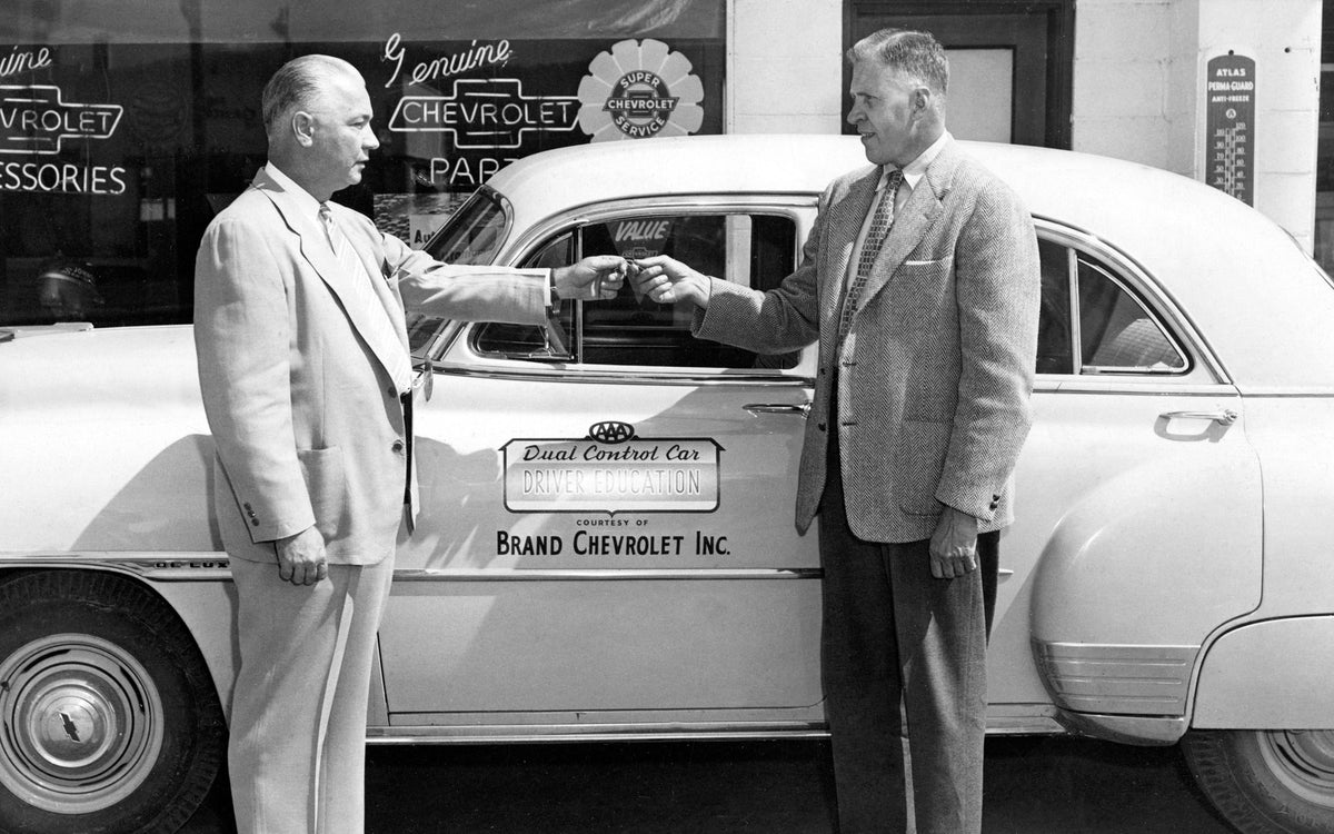 Brand Chevrolet, 105 West Main St., Waynesboro, 1940s. Harry Black (left) handing keys to Harry Porter. Courtesy Waynesboro Public Library Collection