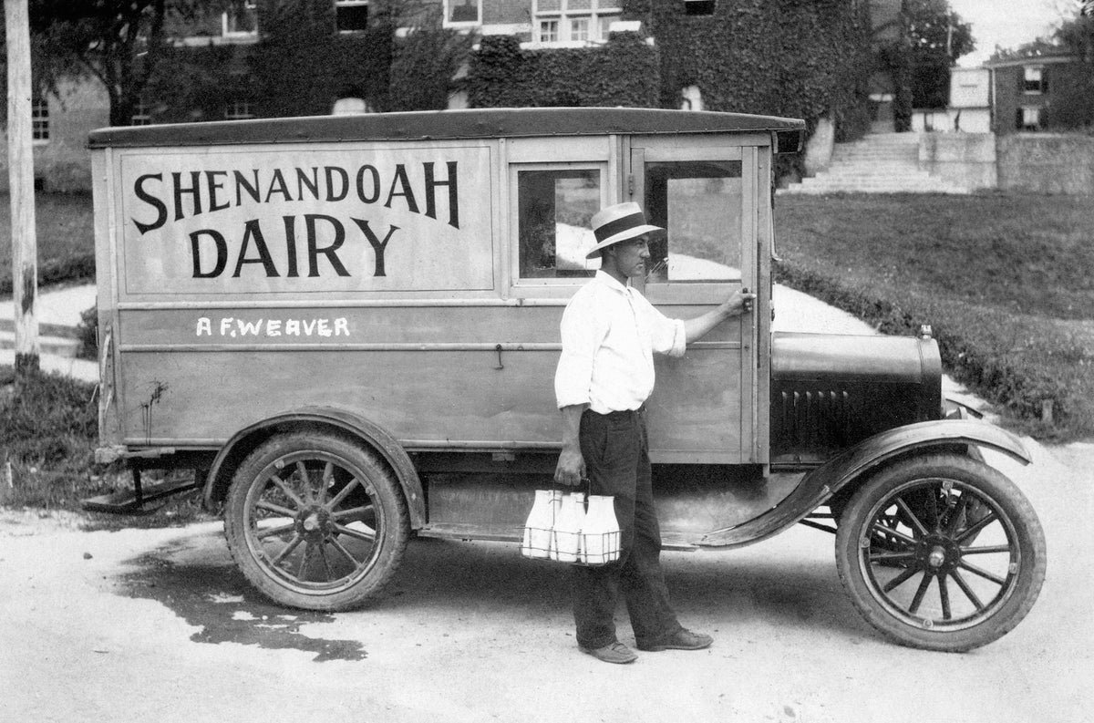 Abner Weaver, owner of Shenandoah Dairy, standing next to his delivery truck, Waynesboro, 1928. Courtesy Waynesboro Public Library Collection