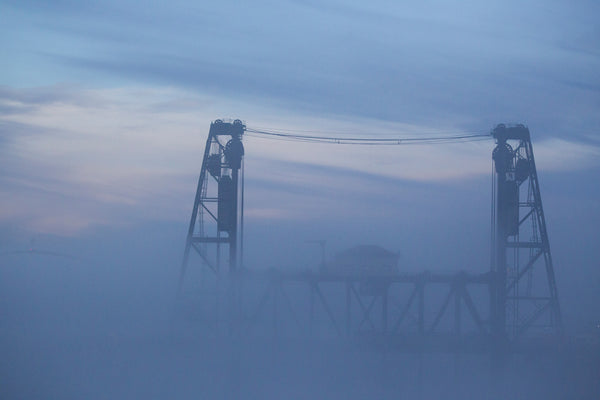 The Steel Bridge rises above the early morning fog. Beth Nakamura/The Oregonian/OregonLive