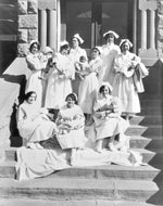 Nurses holding babies in front of Wyoming General Hospital in Rock Springs, May 16, 1929. Wyoming State Archives