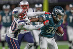 Eagles rookie Corey Clement fights off New England’s Duron Harmon during his 55-yard reception in the second quarter. Courtesy Michael Bryant / Staff Photographer