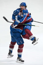 Josh Manson (42) of the Colorado Avalanche celebrates his game-winning goal with teammate Samuel Girard (49) of the Colorado Avalanche during the overtime period of Colorado’s 3-2 win at Ball Arena on Tuesday, May 17, 2022. The Avalanche took a 1-0 lead in the best-of-seven conference semifinals series. Aaron Ontiveroz/The Denver Post