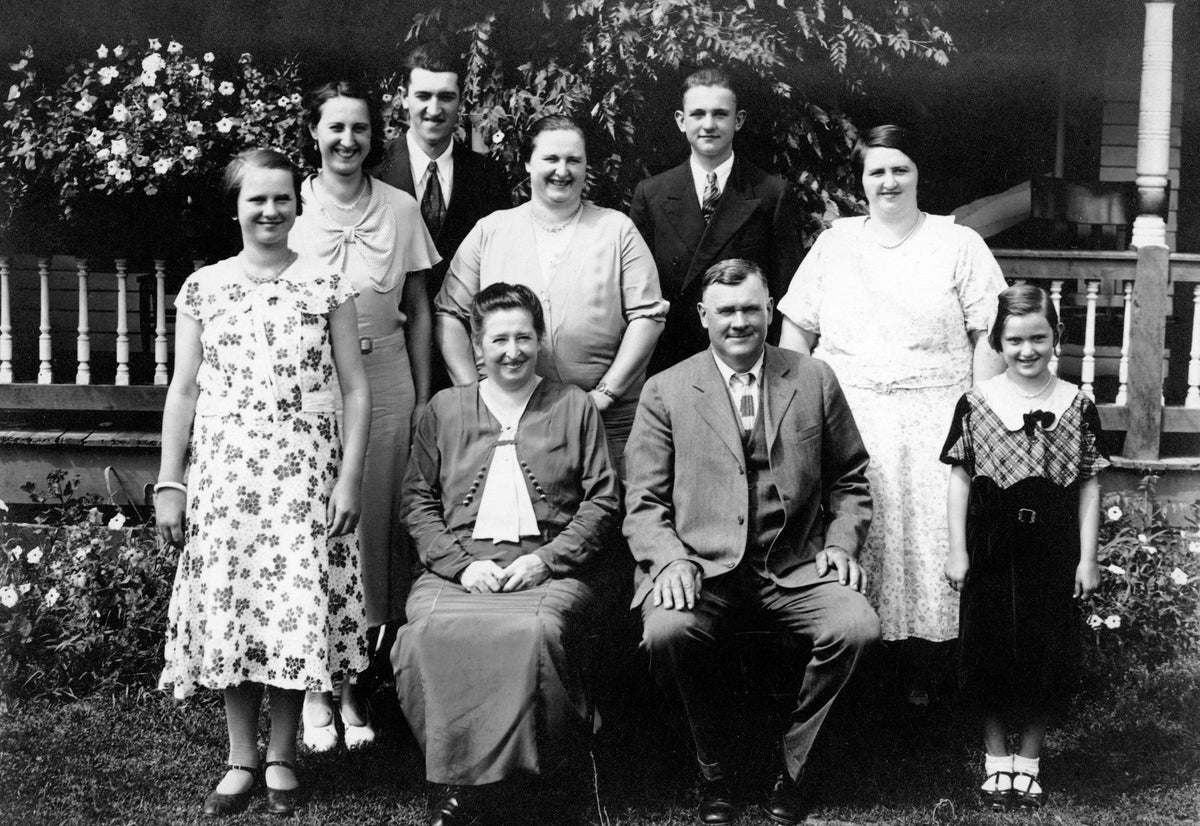 Henry and Jennie Jentes Finzer family at their home in Sugarcreek, 1935. Seated, from left: Henry and Jennie Jentes Finzer. Standing: Laura Finzer Rowe, Laverne Finzer Swihart, Donald Finzer, Helen Finzer Zumbach, Dalton Finzer, Alice Finzer Lahmers, Isabelle Finzer Pietro. The photo donor is the daughter of Dalton and Florence Finzer. Courtesy Vivian Scott