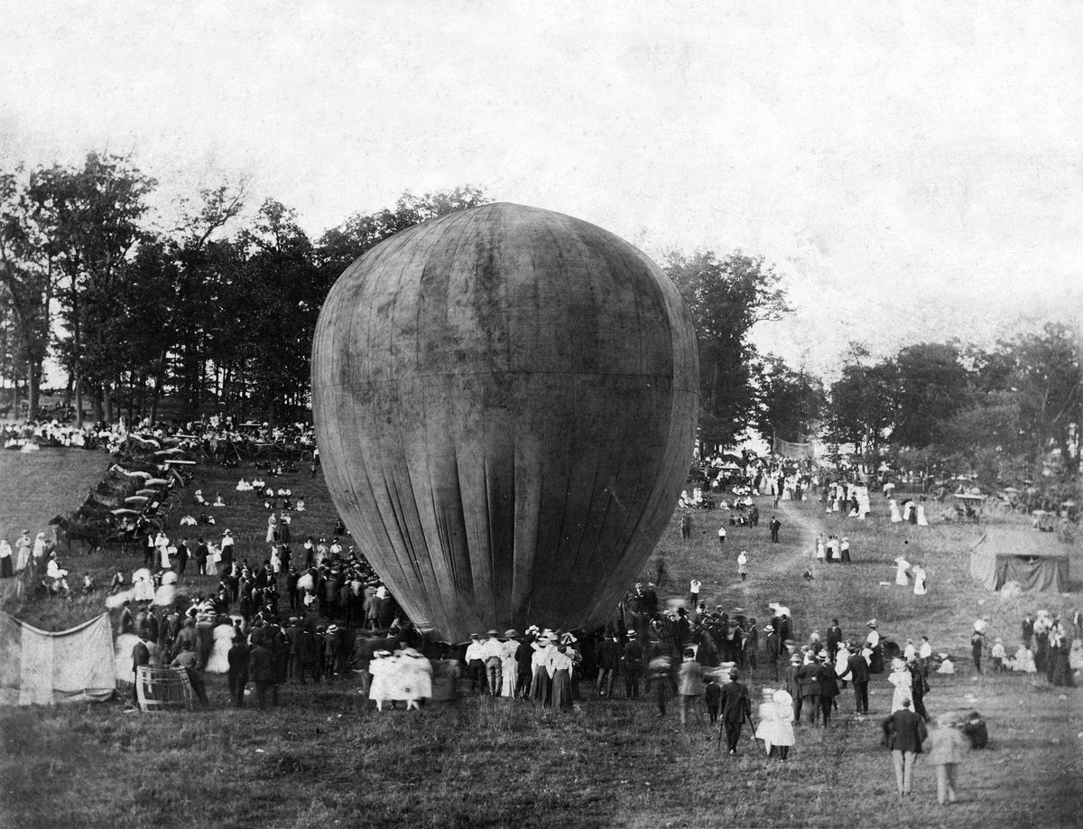 Crowds gather around a hot air balloon at a picnic in Shutts woods for Baltic’s first homecoming, 1910. Courtesy Baltic Area Historical Society