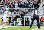 UCF’s Dredrick Snelson catches the ball for a touchdown in front of USF’s Nico Sawtelle. Aileen Perilla / Orlando Sentinel