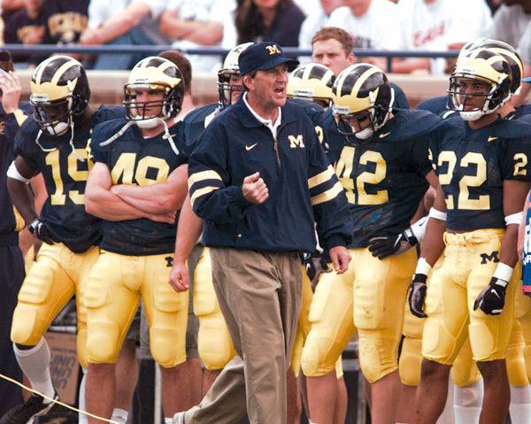 Michigan head football coach Lloyd Carr walks the sidelines during their game with Baylor at Michigan Stadium, Sept. 20, in Ann Arbor, MI. Julian H. Gonzalez / Detroit Free Press