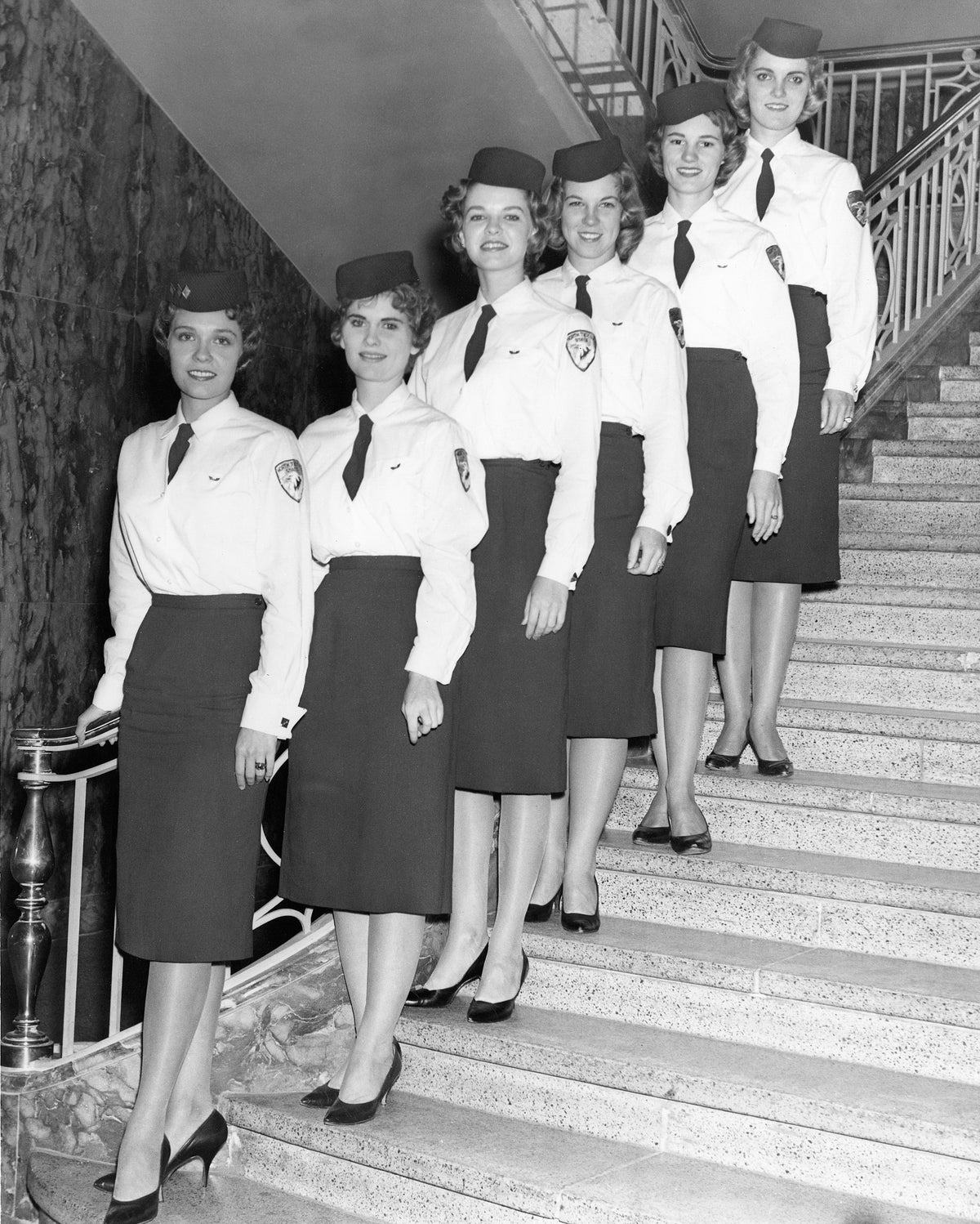 Members of Angel Flight, the women’s Air Force ROTC, in the Administration Building at North Texas State College in Denton, 1960. From left: La Quita Noble, Barbara Evans, Mary Bowers, Carole Feland, Gail Halliburton, Lina Wicker. Courtesy University Photograph Collection (U0458), University of North Texas Special Collections / #UNTA_U0458-004-018