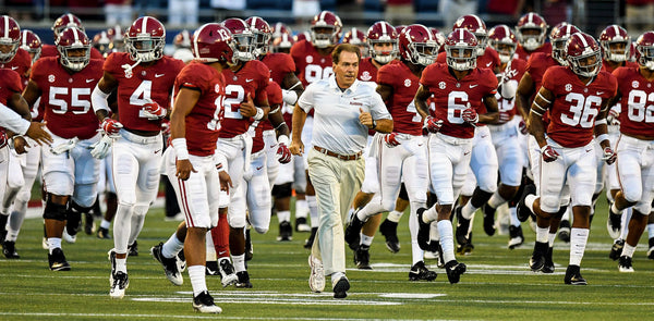 Alabama head coach Nick Saban leads Alabama onto the field for warmups before the Camping World Kickoff at Camping World Stadium in Orlando, Fla., on Saturday Sept. 1, 2018. Mickey Welsh