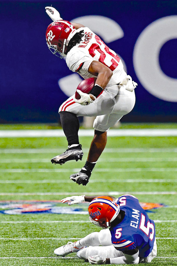 Once again, it was Hurdling Harris to the rescue for the Crimson Tide. For a change, Alabama needed each and every one of its 52 points, 33 first downs and 605 yards by an offense starring Mac Jones, DeVonta Smith and Najee Harris. “I have to give our offense a lot of credit,” coach Nick Saban said. “These guys were pretty phenomenal all year. They certainly delivered tonight when we needed them to.” ADAM HAGY/USA TODAY SPORTS