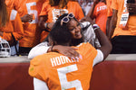 Tennessee quarterback Hendon Hooker (5) hugs a fan after the second half of a game between the Tennessee Vols and Florida Gators, in Neyland Stadium, Saturday, Sept. 24, 2022. Tennessee defeated Florida 38-33. (Caitie McMekin/News Sentinel)