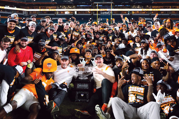 Tennessee Volunteers players and coaches pose for a photograph after defeating the Clemson Tigers in the 2022 Orange Bowl at Hard Rock Stadium. (Rich Storry-USA TODAY Sports)