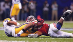 Alabama Crimson Tide linebacker C.J. Mosley (32) is hit by  LSU Tigers quarterback Jordan Jefferson (9) after Mosley intercepted a pass from Jefferson during the BCS National Championship game at the Louisiana Superdome, Jan. 9, 2012. Marvin Gentry / USA TODAY Sports
