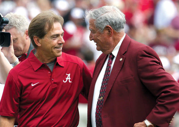 Alabama Crimson Tide head coach Nick Saban meets with Texas A&M Aggies former player and coach Gene Stallings at Kyle Field. Stalings was one of the 'junction boys' under coach Bear Bryant. Matthew Emmons / USA TODAY Sports