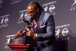 Alabama running back Derrick Henry kisses the Heisman Trophy during a press conference at the New York Marriott Marquis after winning the trophy during the 81st annual Heisman Trophy presentation, Dec. 12, 2015. Brad Penner / USA TODAY Sports