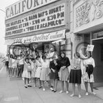 Fans, both young and old, lined up to take in the Beatles’  A Hard Day’s Night at the California Theatre in August 1964. “I don’t want to get mixed up in this,” said a gray-haired man with a cane, waving a hand at the screaming girls. “I just came here to see the Beatle movie.” San Diego History Center, Union-Tribune Collection (#UT85:E541-3)