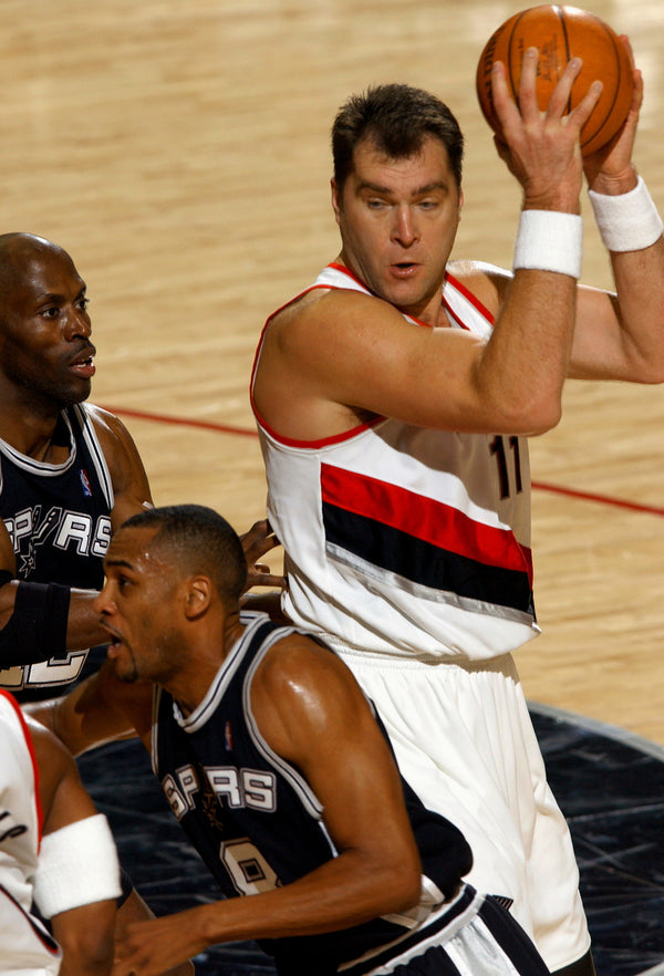 Portland Trail Blazers center Arvydas Sabonis looks for a teammate to cut to the basket as they face San Antonio. Bruce Ely / The Oregonian/OregonLive