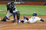 This turned out to be the winning run as Mookie Betts scores from third on an infield grounder in the sixth inning. Wally Skalij / Los Angeles Times