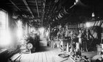 Raleigh Iron Works employees working on the forming process for artillery shells for the US Army and Navy during World War I, circa 1917. Courtesy State Archives of North Carolina / #WWI 4.B1.F36.1