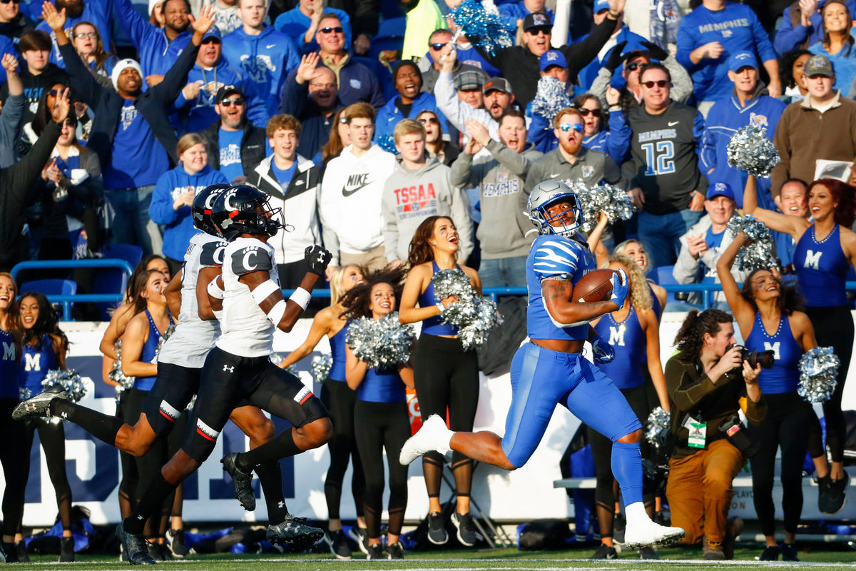 Memphis wide receiver Antonio Gibson sprints the sidelines for a touchdown. Courtesy Joe Rondone / The Commercial Appeal