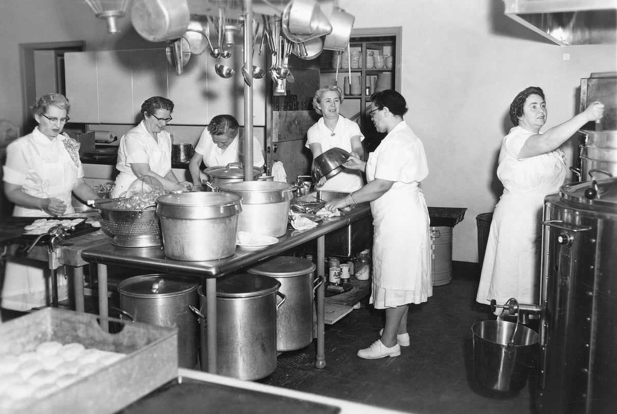 Cafeteria workers preparing fresh meals on site at the Queensbury School, circa 1953. From left: Manager Fannie Ellsworth, Frances Stephenson, Sadie Ramsey, Jennie Purdy, Ruth Cromwell, Ruth Harris. Courtesy Eleanor Oudekerk